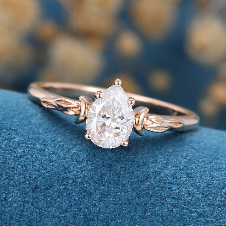 0-69-ct-pear-shaped-moissanite-vintage-solitaire-engagement-ring-5