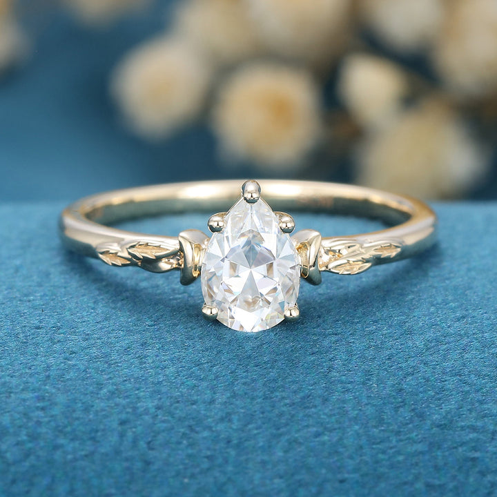 0-69-ct-pear-shaped-moissanite-vintage-solitaire-engagement-ring