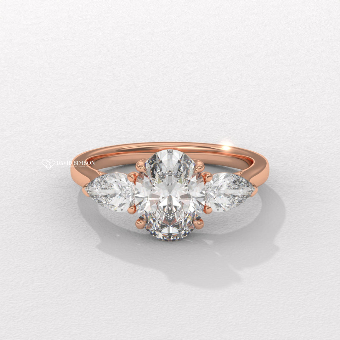 Oval Cut Ring
Side Stone Engagement Ring
VVS Moissanite
Colorless Moissanite