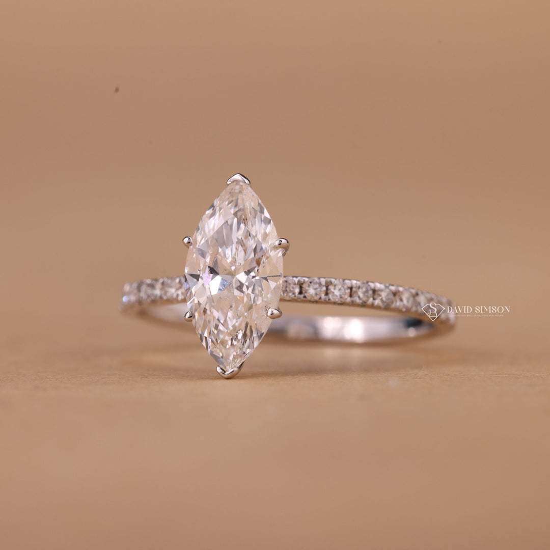 Moissanite Pave Wedding Band
Marquise Solitaire with Pave
Sustainable Moissanite Jewelry
