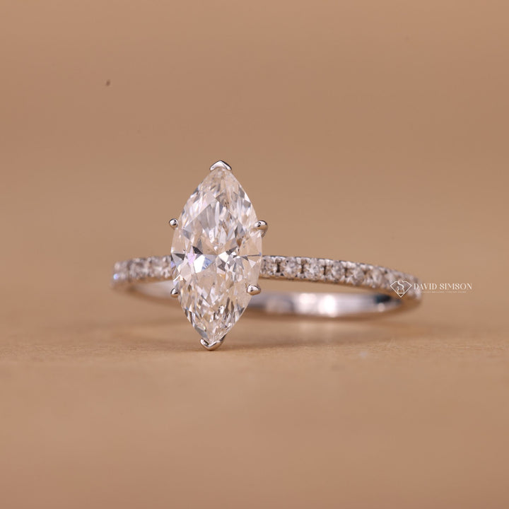 Moissanite Pave Wedding Band
Marquise Solitaire with Pave
Sustainable Moissanite Jewelry
