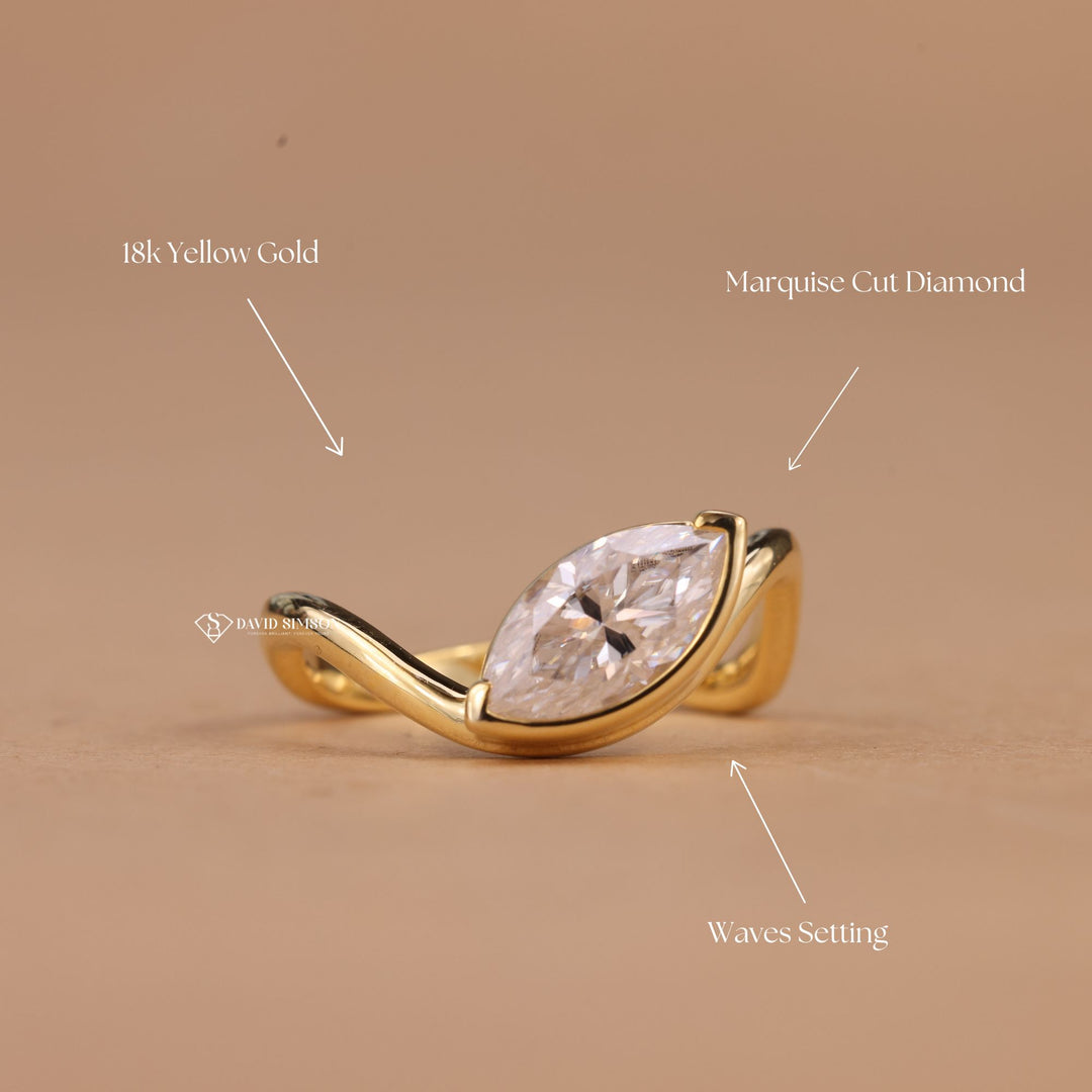 Moissanite Wave Solitaire
14K Gold Marquise Ring
18K Gold Wave Ring
Platinum East West Ring
D Color Marquise Cut
VVS1 Marquise Moissanite