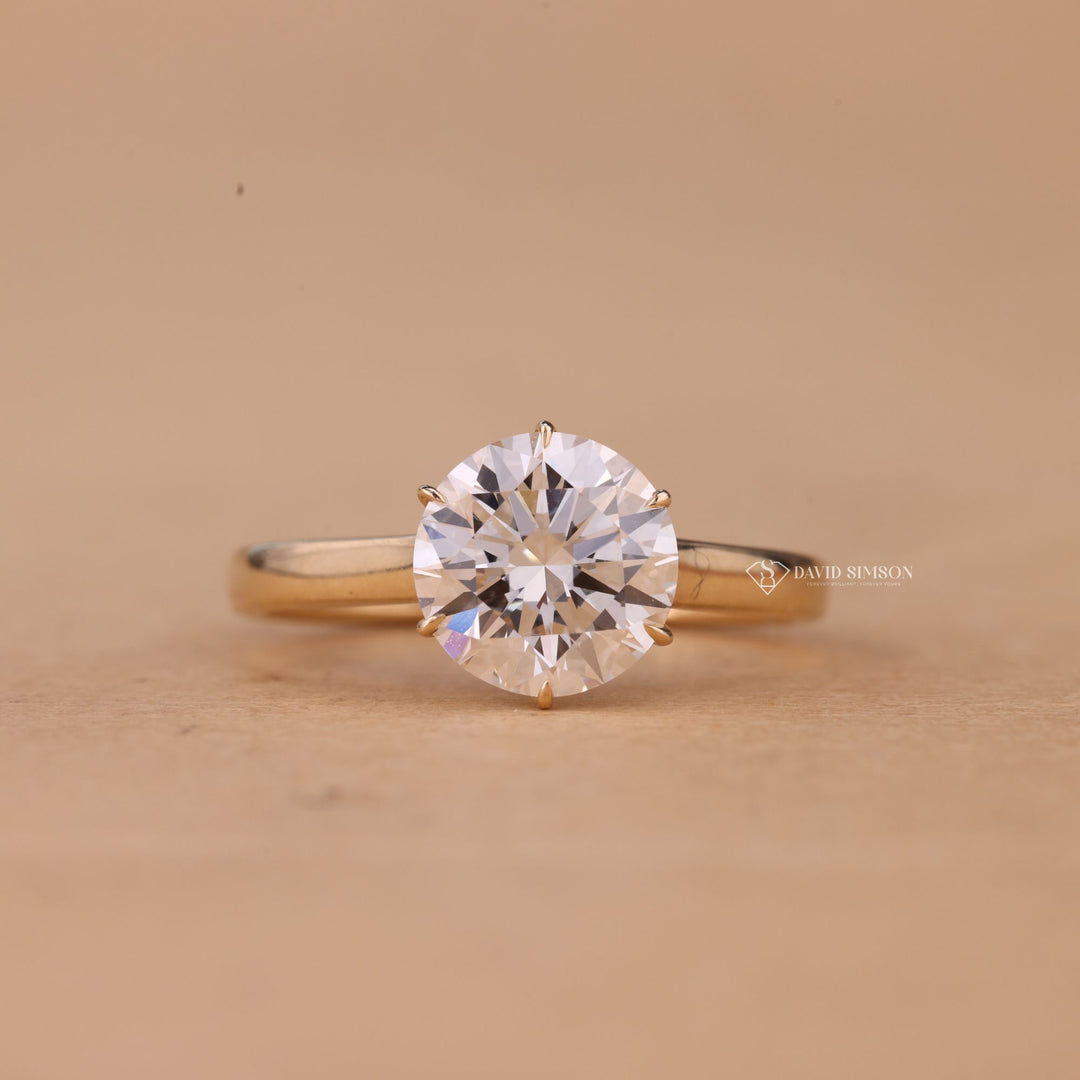 ose Gold Moissanite Ring
Elegant Solitaire Ring
Classic Cathedral Setting
Round Moissanite Jewelry
