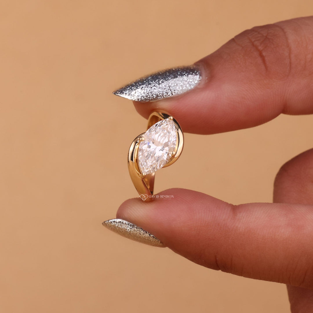 Rose Gold East West Ring
Modern Marquise Jewelry
Unique Diamond Alternative
Conflict Free Engagement
Elongated Marquise Cut