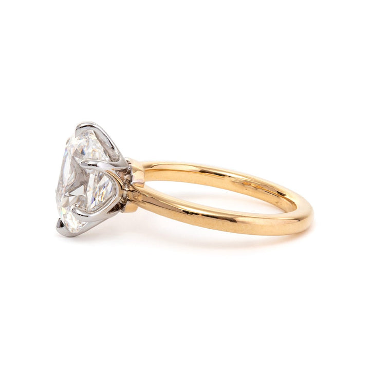 ethical antique diamond, sustainable diamond ring, GIA certified old mine, antique cushion solitaire, 18k gold and platinum, yellow gold and white gold, two-tone solitaire, yellow gold basket, white gold band, romantic diamond ring, candlelight glow diamond, unique two-tone ring