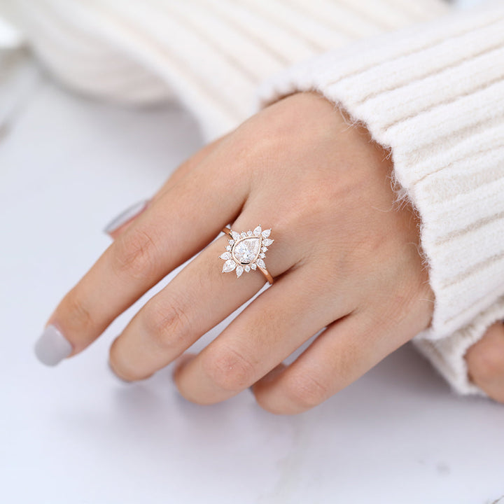 pear-shaped-moissanite-cluster-halo-engagement-ring