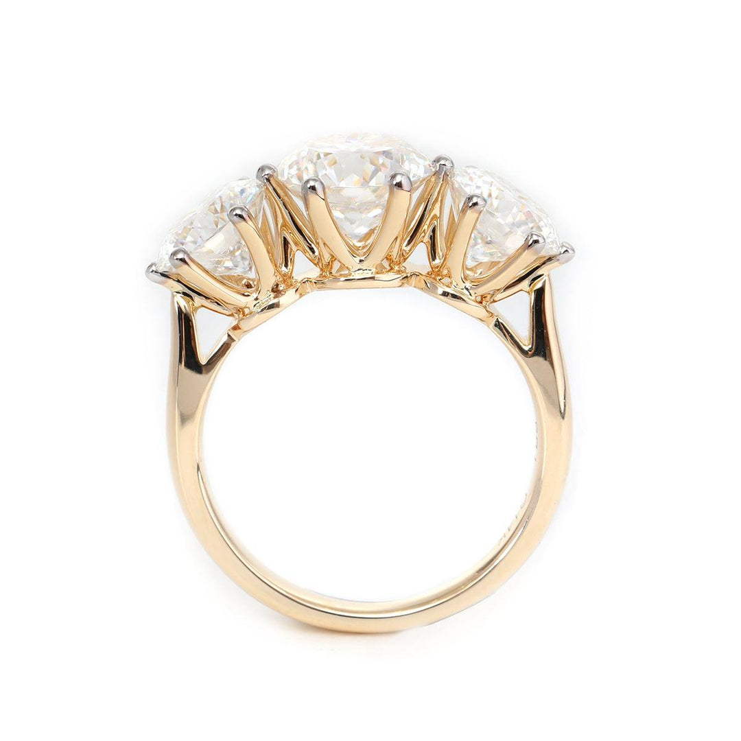 fine jewelry, white gold three stone, yellow gold cathedral, rose gold trilogy, sparkling round diamond, sustainable luxury ring.