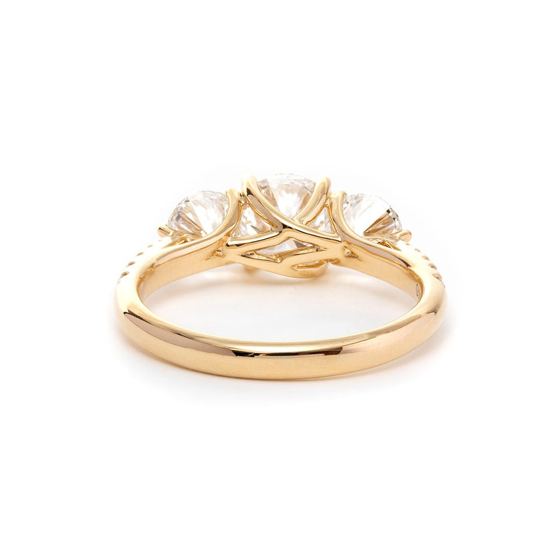 round diamond ring
three stone ring
pavé engagement ring
diamond engagement ring
round cut diamond
three stone engagement ring
pavé diamond ring
