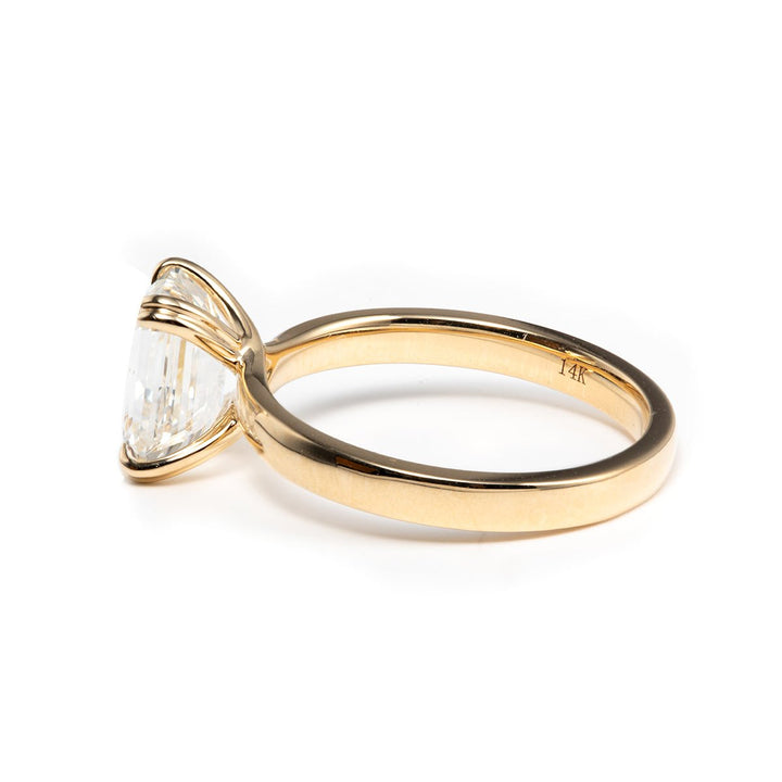 emerald cut diamond ring with side stones
emerald cut halo engagement ring
minimalist emerald cut engagement ring