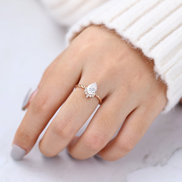 pear-shaped-moissanite-cluster-engagement-ring