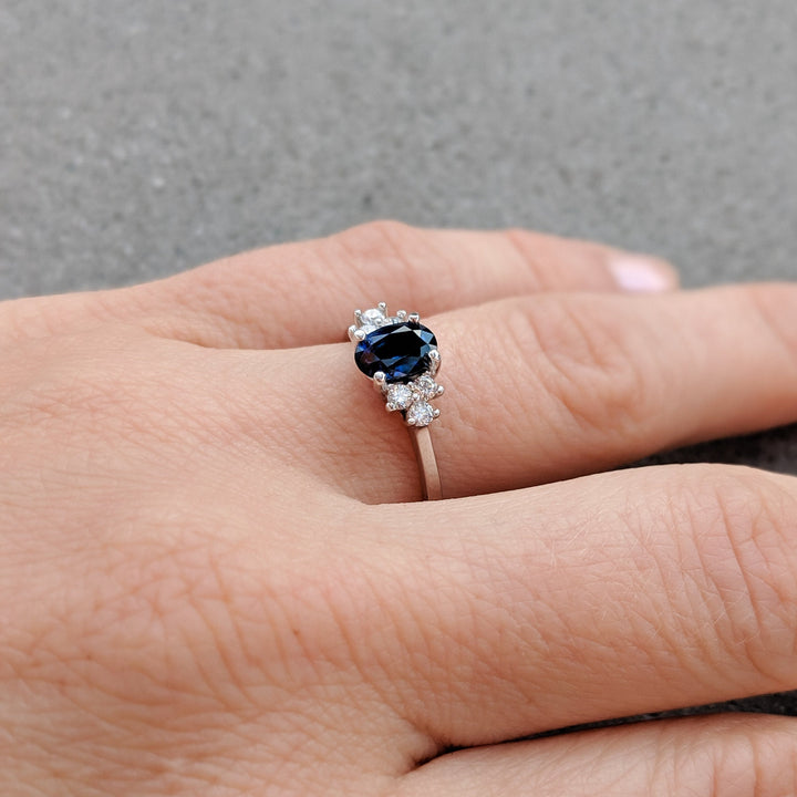 1.0ct-2.0ct Blue Sapphire Oval Cut Diamond Cluster Engagement Ring