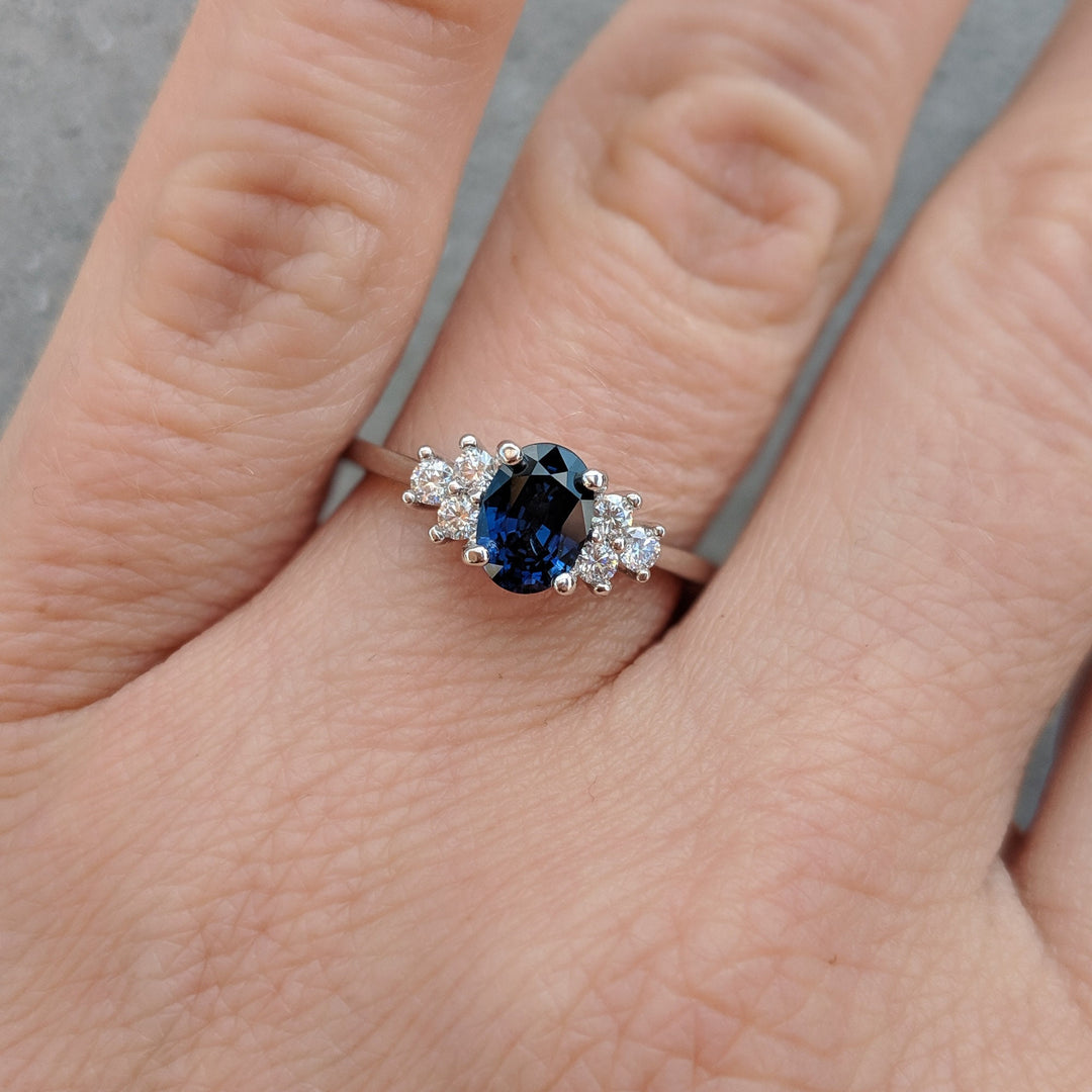 1.0ct-2.0ct Blue Sapphire Oval Cut Diamond Cluster Engagement Ring