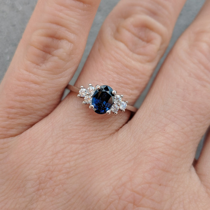 1.0ct-2.0ct Blue Sapphire Oval Cut Diamond Cluster Engagement Ring