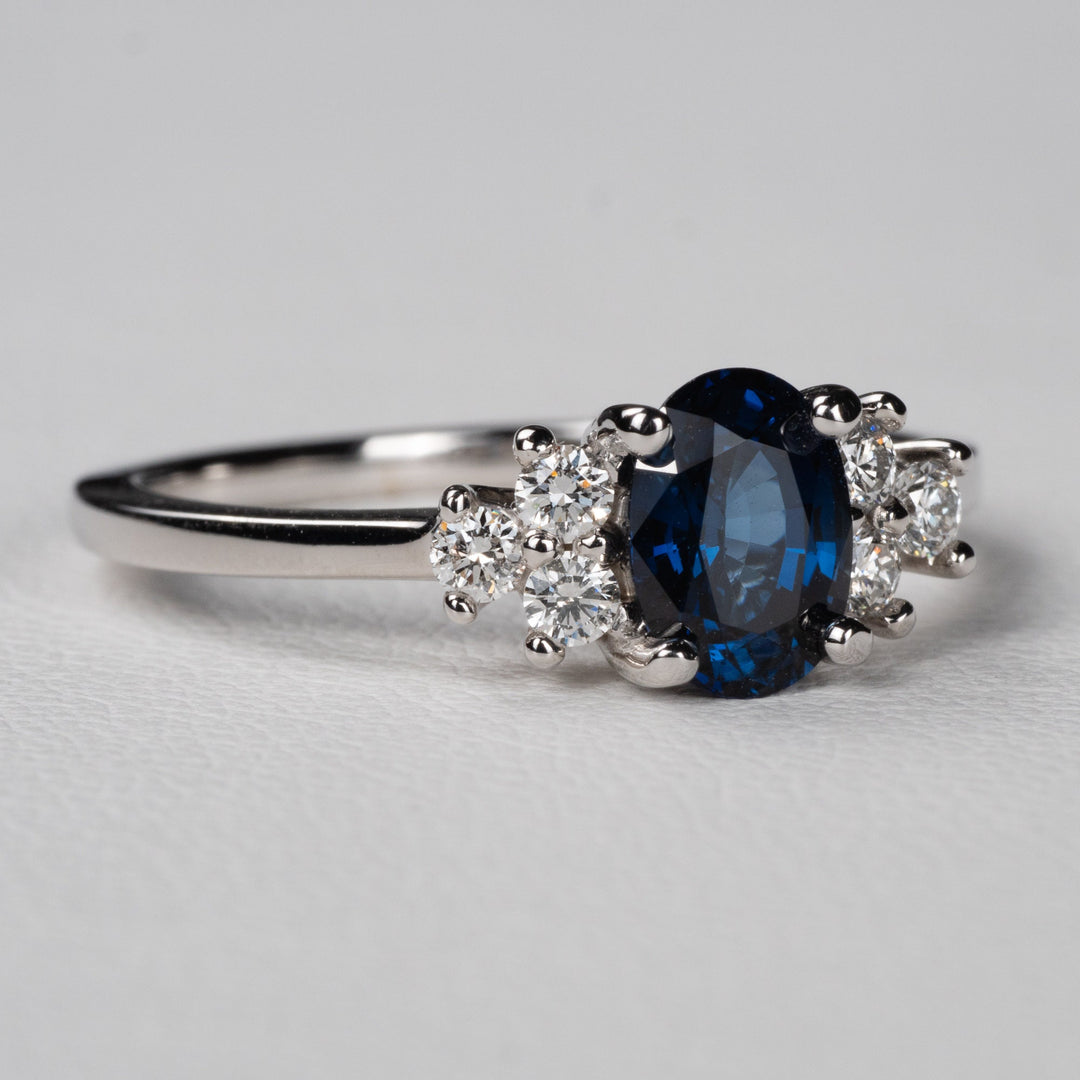 1.0ct-2.0ct Blue Sapphire Oval Cut Diamond Cluster Engagement Ring