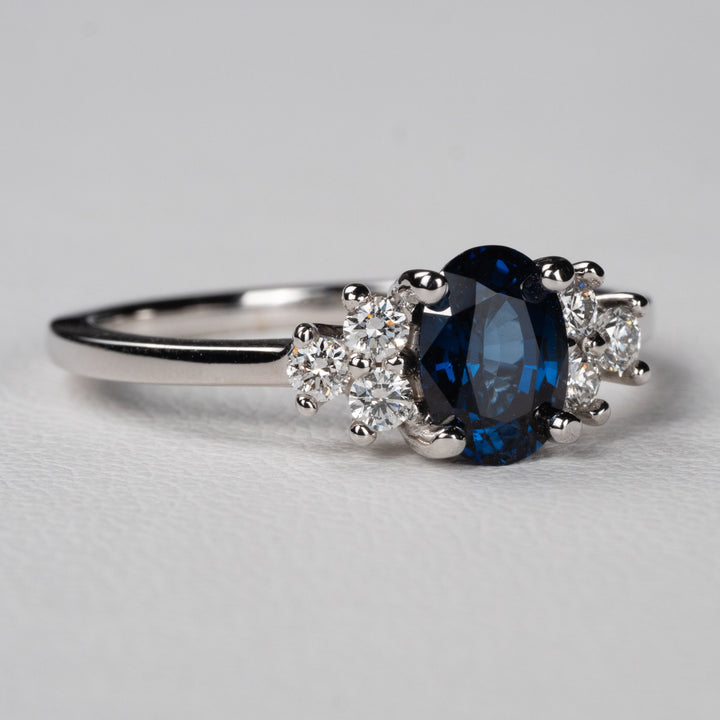 1.0ct-2.0ct Blue Sapphire Oval Cut Diamond Cluster Engagement Ring