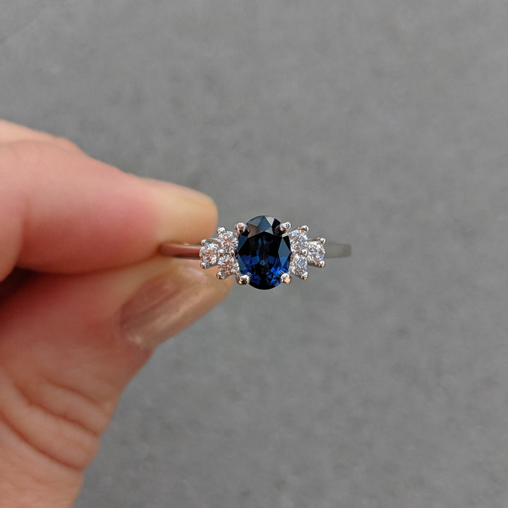 1.0ct-2.0ct Blue Sapphire Oval Cut Diamond Cluster Engagement Ring