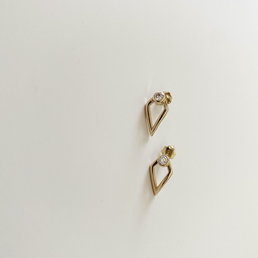 Round Cut Unique Moissanite Diamond Earrings in Yellow Gold