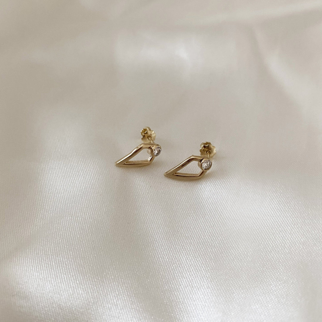 Round Cut Unique Moissanite Diamond Earrings in Yellow Gold