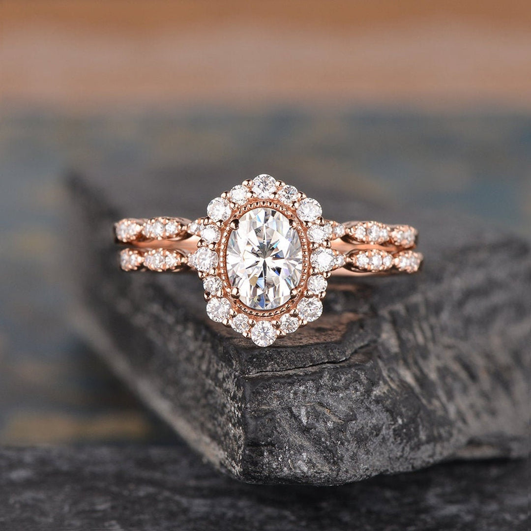 oval-cut-halo-moissanite-bridal-ring-set-1