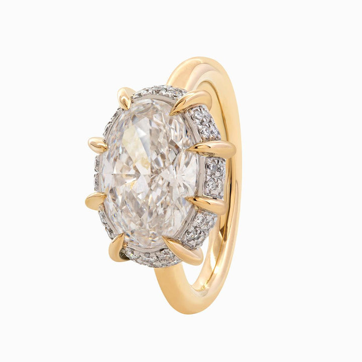 platinum oval solitaire, unique bridal jewelry, ethical oval diamond, lab grown oval ring, GIA certified oval, IGI certified diamond, sphere setting ring, pavé encrusted head, statement engagement ring, artisanal jewelry, custom oval ring, white gold oval, yellow gold pavé, rose gold engagement ring,