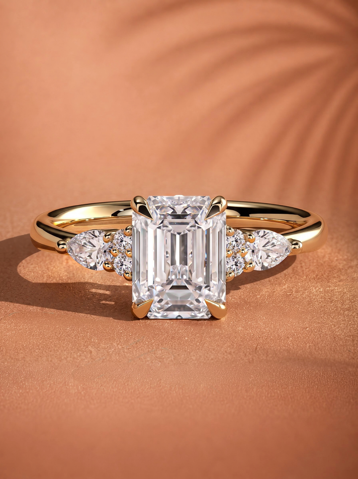 2.0CT to 3.0CT Emerald Cut Lab Grown Diamond Pear Side Stone Cluster Engagement Ring