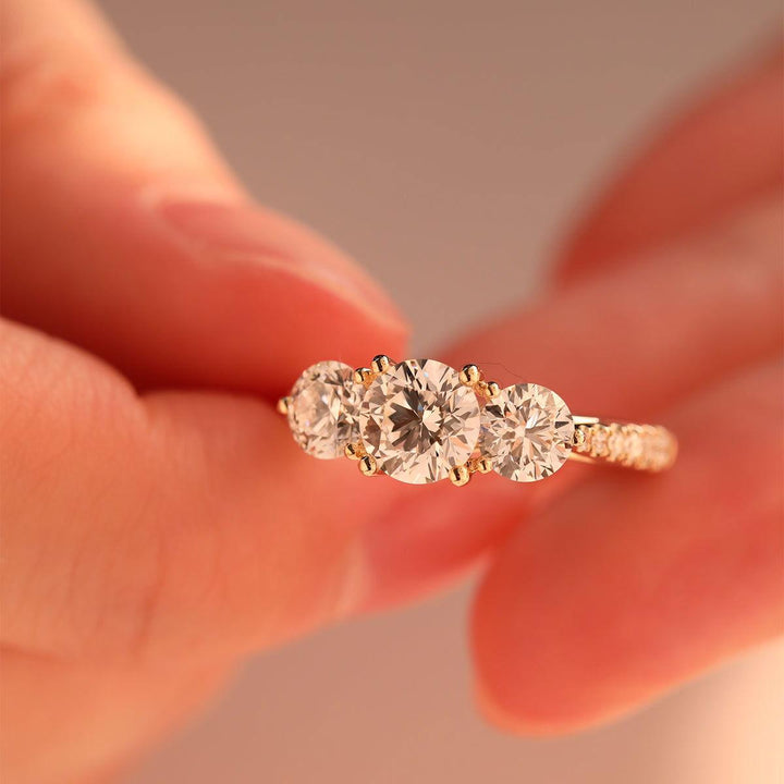 round diamond ring
three stone ring
pavé engagement ring
diamond engagement ring
round cut diamond