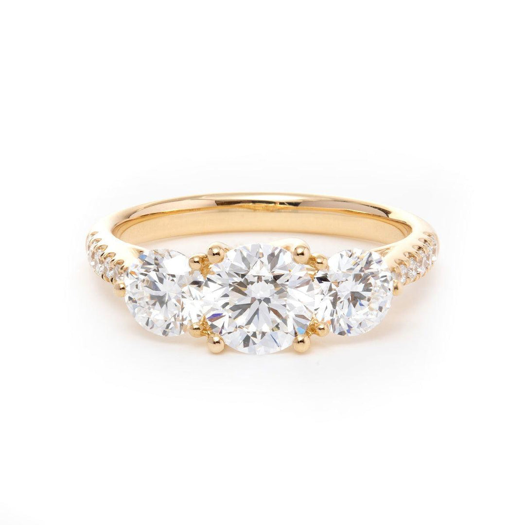 round diamond ring
three stone ring
pavé engagement ring
diamond engagement ring
round cut diamond