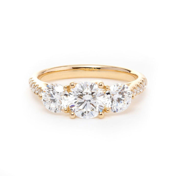 round diamond ring
three stone ring
pavé engagement ring
diamond engagement ring
round cut diamond