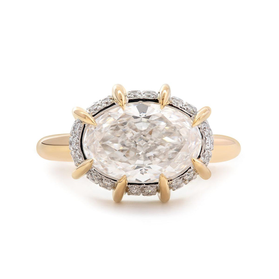 elongated oval diamond, high brilliance oval, modern engagement ring, handcrafted diamond ring, oval diamond with pavé, 18k gold oval ring, platinum oval solitaire, unique bridal jewelry,