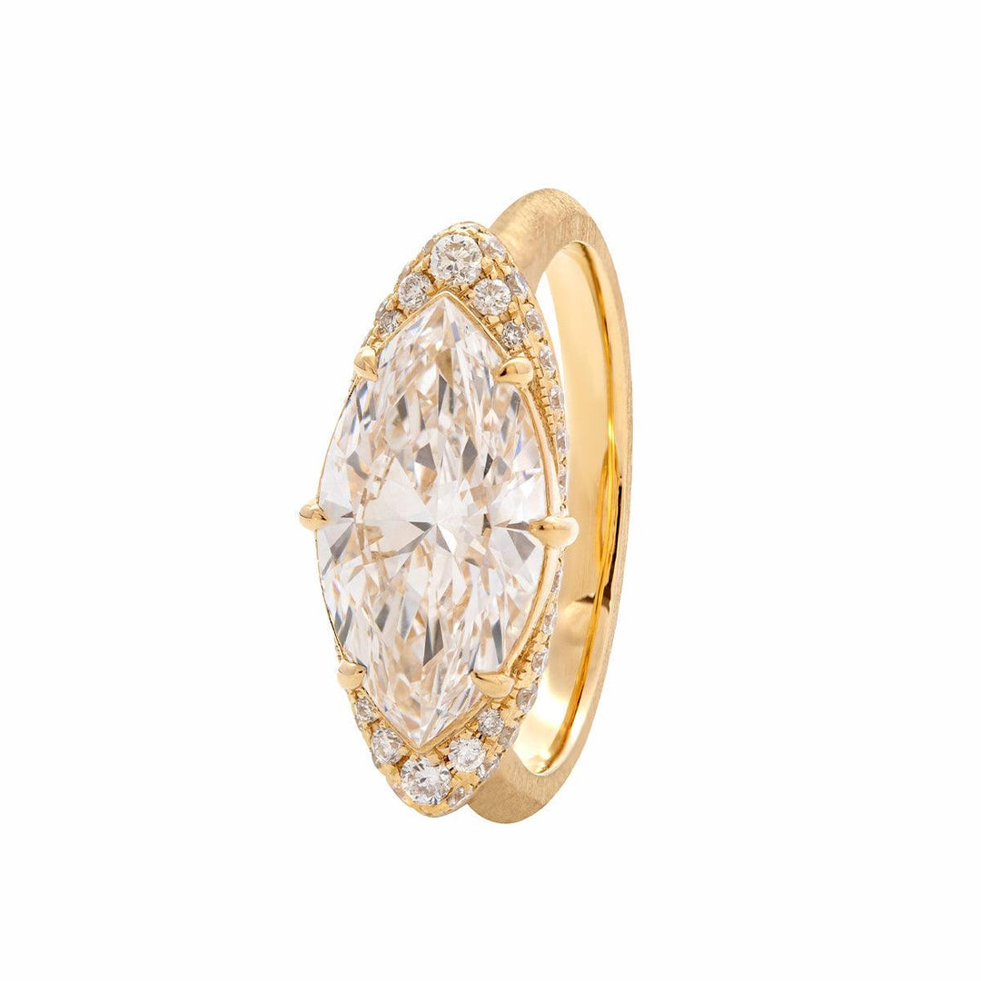 conflict free diamond, custom jewelry design, artisanal engagement ring, marquise mounting, elegant cathedral ring, fancy cut diamond, chic marquise ring, eye shaped diamond, 
