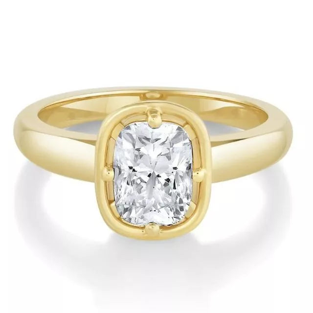 Cushion cut solitaire engagement ring inspired by Zoe Kravitz