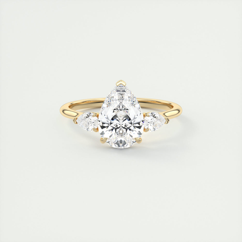 Moissanite ring in 10k yellow gold, an elongated hexagon diamond ring
